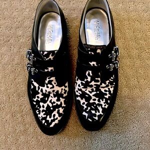 Michael Kors leather flats with black and white calf hair.